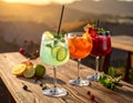 Cocktails are replenished in glasses on the wooden table Royalty Free Stock Photo