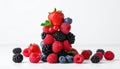 Stack of different fresh tasty berries on white background Royalty Free Stock Photo