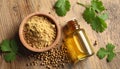Coriander essential oil, powder, seeds and green leaves on wooden table, top view Royalty Free Stock Photo
