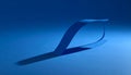 Elegant Blue Paper Strip Twisting with Shadow on Monochromatic Background Royalty Free Stock Photo