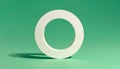 Minimalist light circular ring standing vertically on teal monochromatic background with shadow Royalty Free Stock Photo