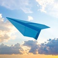 Light blue paper plane flying in sky with clouds with clouds Royalty Free Stock Photo