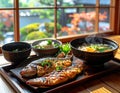 Traditional Japanese breakfast served in ryokan, grilled fish, rice, miso soup, high resolution photography Royalty Free Stock Photo