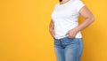 Overweight woman on color background, closeup. Space for text Royalty Free Stock Photo