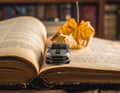Journey of Knowledge: Miniature Car on an Ancient Book Royalty Free Stock Photo