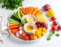 Colorful Hummus and Fresh Vegetable Platter Healthy Vegan Appetizer Board Royalty Free Stock Photo