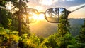 Glasses against the beautiful forest. View more clearly through the lenses. Royalty Free Stock Photo