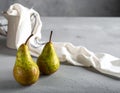 Two ripe pears on the gray table, shut up. Text area Royalty Free Stock Photo