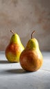 Two ripe pears on the gray table, shut up. Text area Royalty Free Stock Photo