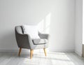 Soft armchair with pillow in light room Royalty Free Stock Photo