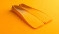Yellow Swimming Fins on an Orange Background - Dive, Snorkel, Summer, Underwater Gear Royalty Free Stock Photo