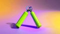 Vibrant Green Hand Grippers for Strength Training on Dynamic Gradient Background Royalty Free Stock Photo