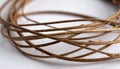 generated using AI.Tightly coiled brown rattan fibers form a circular pattern against a smooth white background. Royalty Free Stock Photo