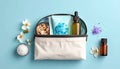 spa-inspired travel pouch filled with amber essential oil bottles and white bath salts Royalty Free Stock Photo