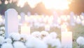 Serene Cemetery Vigil with Memorial Candles and White Flowers Royalty Free Stock Photo