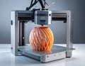 3D Printing Process with Orange Material Royalty Free Stock Photo