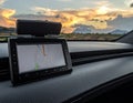 GPS Navigation Device in Car at Sunset Royalty Free Stock Photo