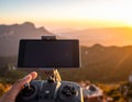 Drone Controller with Smartphone at Sunset Royalty Free Stock Photo
