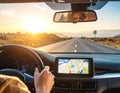 Car GPS Navigation System Displaying Map on Autumn Road Trip at Golden Hour Sunset Modern In Car Technology for Travel and Adventu Royalty Free Stock Photo