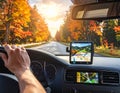Golden Sunset Road Trip with In Car GPS Navigation System and Autumn Landscape View Royalty Free Stock Photo