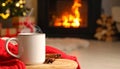 Cup of hot drink near fireplace at home. Space for text Royalty Free Stock Photo