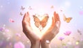 Hands holding green heart with flowers in sunlight symbol of love and nature Royalty Free Stock Photo