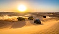 Desert Adventure: Off-Road Vehicles at Sunset Royalty Free Stock Photo