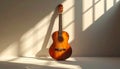 Sunlit acoustic guitar casting shadows on wall evokes peaceful music, songwriting inspiration Royalty Free Stock Photo