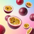 Fresh passion fruits spinning in the air against a color gradient background. Royalty Free Stock Photo