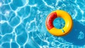 Inflatable ring floating in swimming pool on sunny day, top view with space for text Royalty Free Stock Photo