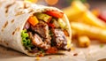 Close-up of a delicious shawarma wrap filled with succulent beef and fresh vegetables Royalty Free Stock Photo