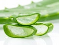 Close-up of a sliced Aloe vera leaf on a wooden surface. Royalty Free Stock Photo