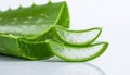 Close-up of a sliced Aloe vera leaf on a wooden surface. Royalty Free Stock Photo