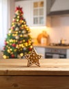 Star-Shaped Gingerbread Cookie on Rustic Wooden Surface with Holiday Kitchen Background Royalty Free Stock Photo