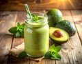 Fresh avocado smoothie in glass with ripe avocados on white marble table Royalty Free Stock Photo