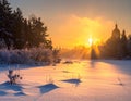 Warm cold winter sunset. Last rays of setting sun coloring the fog golden in this winter Royalty Free Stock Photo
