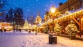 Snowy Dusk Street with Christmas Lights and Glow Royalty Free Stock Photo