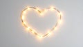 Heart-Shaped String Lights on Neutral Background Royalty Free Stock Photo