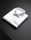 Folded White Dress Shirt on Smooth Matte Black Surface Royalty Free Stock Photo
