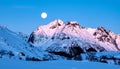 Winter full moon next to the Skolmen mountain peak, Lofoten Islands, Norway Royalty Free Stock Photo