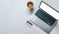 Online Shopping E-commerce Concept Laptop, Credit Card, Coffee on White Desk, Top View Workspace Royalty Free Stock Photo