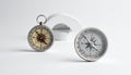 Two Compasses on White Background Royalty Free Stock Photo