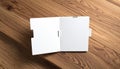 Blank White Folder on Wooden Background Royalty Free Stock Photo