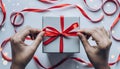 Gift Box with Red Ribbon Decoration Royalty Free Stock Photo