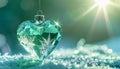 Faceted Crystal Heart on Frost-Green Winter Surface Royalty Free Stock Photo