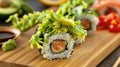 Exquisite Avocado Dragon Roll Sushi on Wooden Board Royalty Free Stock Photo