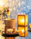 Cozy Winter Fondue Scene with Warm Golden Glow Royalty Free Stock Photo