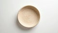 Top-Down View of Round Woven Basket on Matte White Background Royalty Free Stock Photo