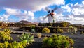 Windmill in the botanic garden of captus of Lanzarote, Canary Islands, Spain Royalty Free Stock Photo