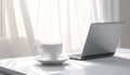 Cup of Tea beside Laptop on Minimal Desk Royalty Free Stock Photo